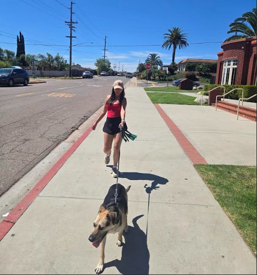 Niki walking a dog in Escondido